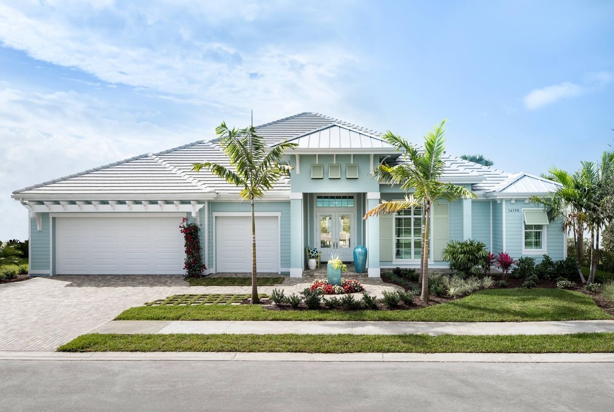 Modern Florida home exterior with fresh white paint at golden hour
